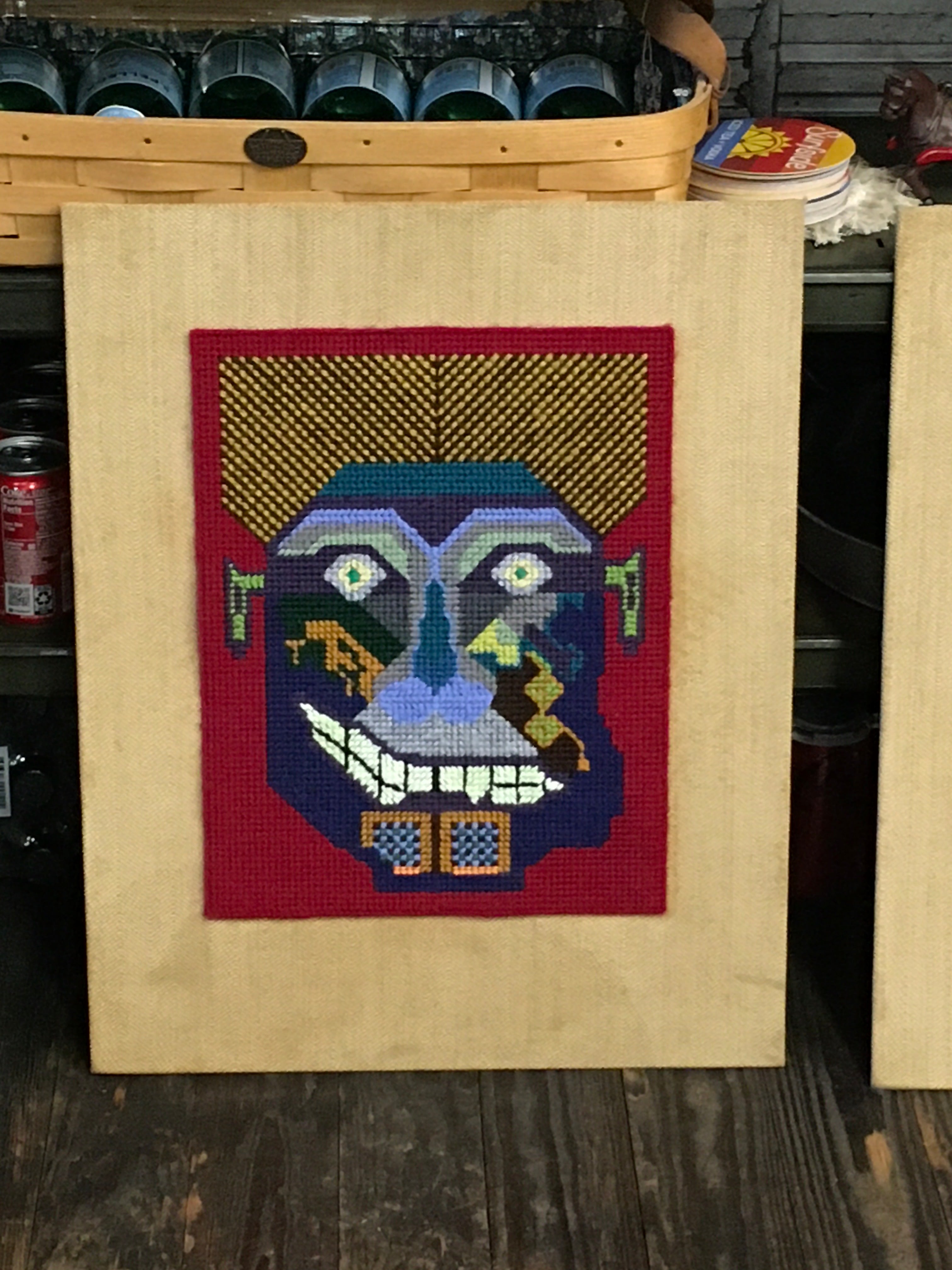 Dave Patterson needlepoint mounted